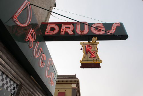 A photograph of the neon sign outside of Corner Drug in Woodland CA